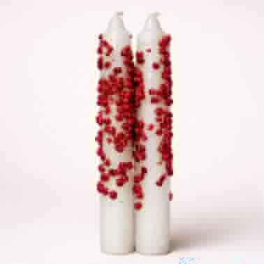 Dos velas rituales de pimienta voladora